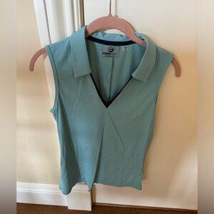 Foray golf top. Turquoise and navy blue.